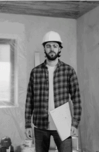 A man bringing a blueprint